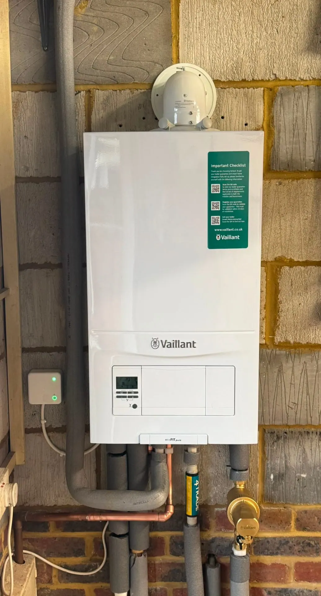 Vaillant ecoFIT pure combi boiler installation with new flue and tidy pipework by Heat Solution London, Ashford